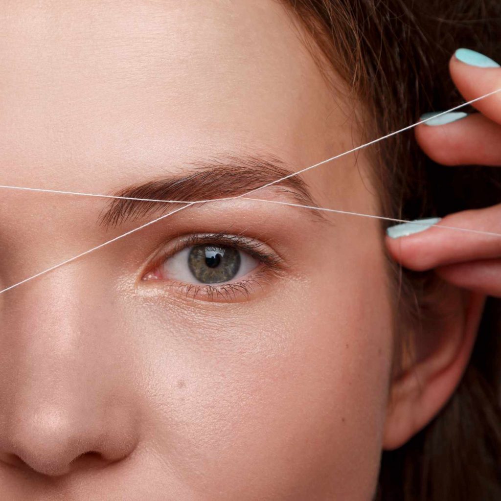 threading hair removal at axis clinic