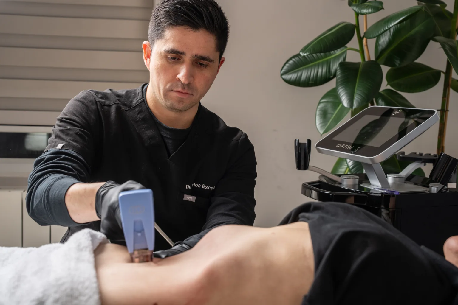 Dr Carlos Escobar performing Morpheus8 treatment at The Axis Clinic in London, using advanced radiofrequency technology to tighten and rejuvenate the skin.