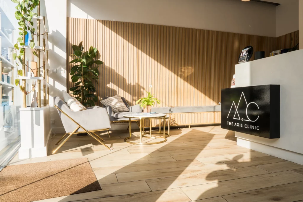 Reception area of The Axis Clinic in London with modern design and natural light