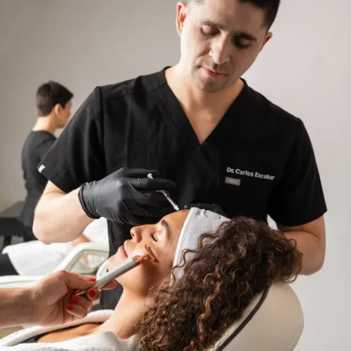 Doctor Carlos Escobar performing anti-wrinkle injections treatment at The Axis Clinic.